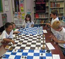 Kids playing Fantasy Chess